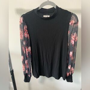 Black sweater with sheer sleeves. Maurice’s. Size small